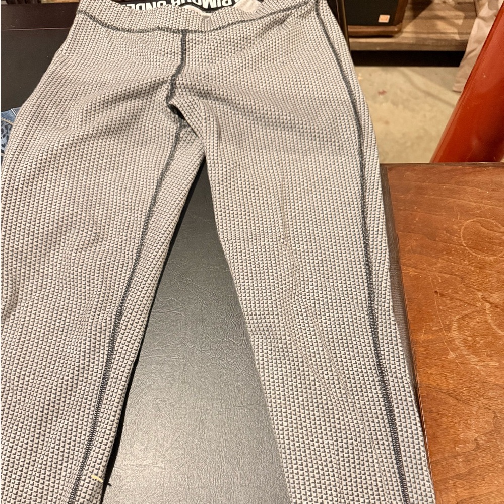 Under Armour leggings. Black small checked detail.